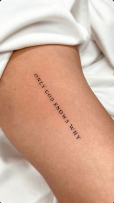 a person with a tattoo on their arm that says, why not now you can