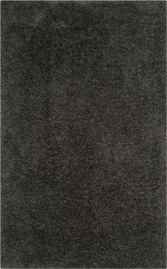 an area rug with dark gray colors