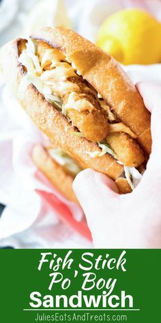 fish stick po boy sandwich with lemons in the background