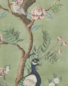 a bird sitting on top of a tree next to flowers