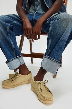 A timeless classic returns: these moccasins from Clarks feature the same details you know and love from the original style. **Features:** Slip-on style, suede uppers, round toe, mocc stitching, EVA midsole, natural rubber crepe sole, 2-eyelet lace-up closure, branded fob **Why We | Clarks Wallabee Moccasins at Free People in Tan, Size: US 8 Clarks Wallabees Women's, Clarks Wallabee, Clarks Wallabees, Suede Moccasins, Style 2023, Classy Casual, Pink Suede, Eyelet Lace, Fall 2024