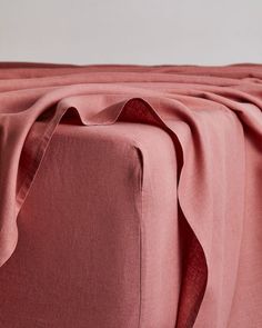 Ultra soft and incredibly durable, our 100% French flax linen fitted sheet in Pink Clay is the foundation for a beautifully made bed. With a generous fit that snugly hugs every corner, this modern heirloom is made to keep. The thing about linen is it only gets better over time; the more you use and wash it, the softer and more comfortable it gets. What’s more, linen is good for you too: it’s anti-static, anti-bacterial and naturally temperature-regulating, meaning your sheets will keep you cool Pink Bed Sheet, Flax Linen Bedding, Arts Aesthetic, Bed Threads, Made Bed, Pink Bed, House Color Palettes, Linen Sheet Sets, Fall Winter Trends