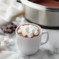 hot chocolate with marshmallows in a white mug