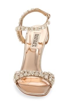 Sparkling crystals embellish the straps of an elegant sandal lifted by a metallic setback heel. 4" heel Adjustable ankle strap with buckle closure Cushioned footbed Leather or textile upper/synthetic and leather lining/leather sole Imported Women's Shoes Heels With Wedding Dress, Sparkle Wedding Shoes, Moh Proposal, Heels Classy Elegant, Quinceanera Shoes, Shoes For Ladies, Proposal Boxes, Jasmine Tea, Cute Shoes Heels