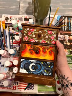 A painted mini dresser inspired by ACOTAR / Feyre's! The perfect complement to your bookshelf, right next to your favorite series <3 Approximately 5 hours of hand painting, they are each individually painted so the design varies slightly! If you are interested in any custom requests feel free to reach out through email or message: yareliparra77@gmail.com Dimensions: 5.71 x 3.74 x 8.27 inches Content: 70% solid paulownia wood and 30% plywood Feyre Painted Drawers, Feyre's Drawers, Feyre Drawers, Feyre Dresser Painting, Feyre's Paintings, Acotar Home Decor, Acotar Dresser Painting, Acotar Drawers, Feyre Dresser