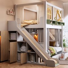 a child's bedroom with bunk beds, stairs and storage space in the middle