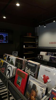 there are many records on display in the store