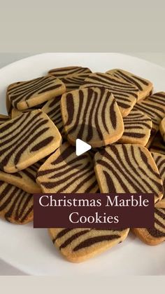 christmas marble cookies on a white plate with the words'christmas marble cookies'in front of it