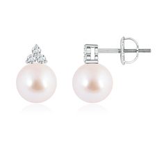 Lustrous Akoya cultured pearls are topped with trios of sparkling diamonds in prong settings. The beautiful pearls captivate with their iridescence and are enhanced by the brilliance of the precious diamonds. Designed in 14K white gold, these classic Akoya cultured pearl earrings make a dainty and elegant accessory. Pearl Earrings With Diamond Accents, Round Cut, Pearl Diamond Round Earrings, Round Pearl Diamond Earrings, Pearl Earrings With Prong Setting, Akoya Pearl Earrings, Akoya Pearls, Elegant Accessories, Pearl Stud Earrings, Pearl Studs