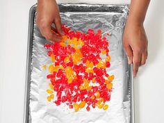 someone is making gummy bears out of aluminum foil