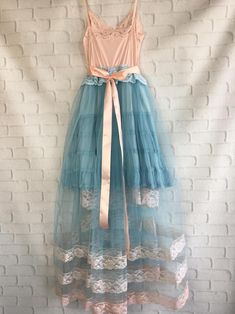 Whimsical Fitted Tulle Dress, Whimsical Fitted Prom Dress, Peach Princess Dress For Summer, Peach Princess Style Summer Dress, Vintage Tulle Dresses For Spring, Vintage Tulle Dress For Spring, Vintage Fitted Tulle Dress, Fitted Vintage Tulle Dress, Fitted Vintage Tulle Skirt Dress