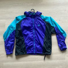 In Amazing Condition Given That’s Its Vintage From The Early 90’s. No Stains Or Tears. Size Large. Could Be Unisex. Coats Vintage, Wind Breaker, Vintage Nike, Men's Nike, Blue Purple, Nike Jacket, Nike Men, Blue And Purple, Mens Jackets