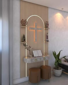 a living room with a cross on the wall