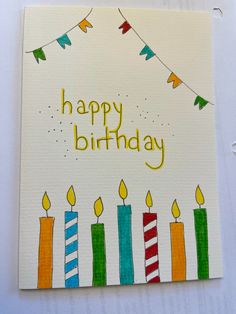 a birthday card with candles on it