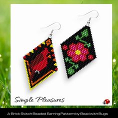 a pair of beaded earrings with flowers on them