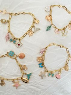 #charms #charmbracelrt #bracelet #braceletsforwomen #friendship #friendshipbracelet #vintage #vintagejewelry #chunkyjewelry #goldbracelet #goldjewelry #jewelryinspo #cutejewelry #aesthetic #girly #girlhood #personalisedjewelry #charmbracelet #charmnecklace #trendyjewelry Braclet Aesthetic, Necklace Business, Gold Jewelry Bracelet, Rococo Jewelry, Charm Necklace Diy, Shell Charm Necklace, Girly Bracelets, Charm Bracelet Gold, Accessories Business