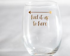 a wine glass with an arrow that says had it up to here