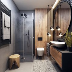 a modern bathroom with wood paneling and glass shower