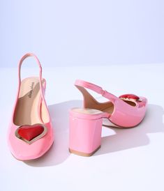 These sweet slingback heels from Unique Vintage are crafted in a pink patent leatherette and feature a red and gold heart accent on the vamp. Complete with a 3 inch block heel. Available while supplies last. Random Clothes, Clothes Board, Clothing Reference, Summer Closet, Slingback Heels, Purple Shoes, Shoes Collection, Vegas Wedding, Heels & Wedges