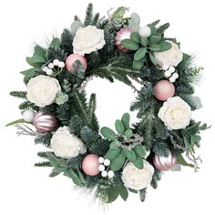 a christmas wreath with white flowers and greenery