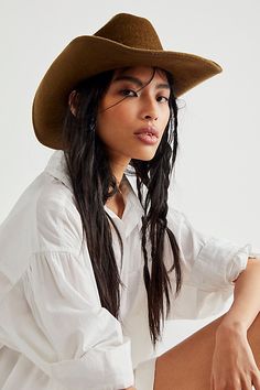 So chic western-inspired hat featured in a classic cowboy shaped silhouette with a cattleman crease crown, upturned brim, and interior ribbon adjuster for a so-perfect-fit. * Interior sweatband * Adjustable fit * Structured style | Cash Cowboy Hat by Wyeth at Free People in Brown Cowboy Hat Outfit Woman, Brown Cowboy Hat, Hat Aesthetic, Black Cowboy, Western Hats, Outfits With Hats, Cool Hats, Wool Hat, Cowboy Hat