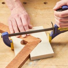 a man is using a circular saw to cut wood with a jik on the table