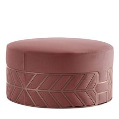 a pink ottoman with an intricate design on the front and back side, sitting against a white background