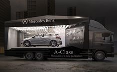 a mercedes benz ad on the back of a truck