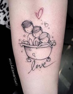 a couple sitting in a bathtub with the word love tattooed on their arm and behind them