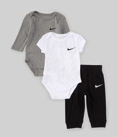 From Nike&#x2C; this 3-piece set features: Bodysuit:1 x long-sleeve1 x short sleeveSoft rib fabricSnap closure Swoosh logo on chest Bottom:1 x joggersEncased waistband and ribbed cuffsSwoosh logo on left thighCare:Cotton/polyesterMachine wash/tumble dry Imported. Baby Boy Necessities, Nike Cotton Onesie For Playwear, Baby Clothes Black Babies, White Nike Playwear Sets, Baby Boy Newborn Outfits, Baby Boy Fits, Newborn Outfits Boy, Winter Baby Clothes Newborn