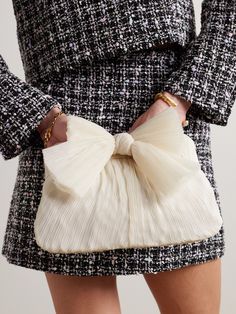 Loeffler Randall's 'Rayne' clutch is a glamorous option for occasions when you just need the essentials. It's made from white plissé-organza and topped with an artful bow. Secure your phone, cards and compact inside, attaching the chain strap to go hands-free. Elegant Beige Evening Bag For Spring, White Party Bag With Bow, White Party Bags With Bow, Elegant Wedding Bags With Bow, Elegant Wedding Bags With Bow Detail, Feminine Beige Evening Bag, Beige Feminine Evening Bag, Cream Clutch Evening Bag For Party, Elegant Spring Bags