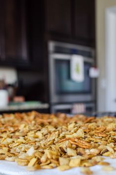 a large tray filled with food sitting on top of a counter next to a stove