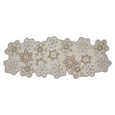 an embroidered lace border with snowflakes and stars on the edges, in white