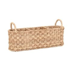 a large woven basket with handles on the front and sides, in natural color wicker