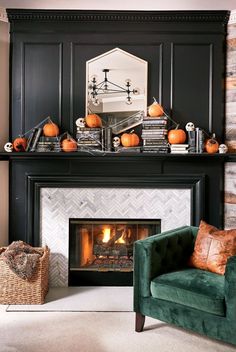 a living room filled with furniture and a fire place in front of a mantel