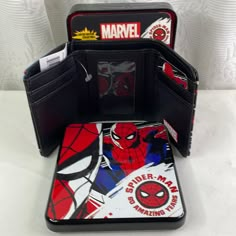 the spider man wallet is open and ready to be used as a card holder for cards