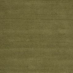 an olive green rug with very thin lines