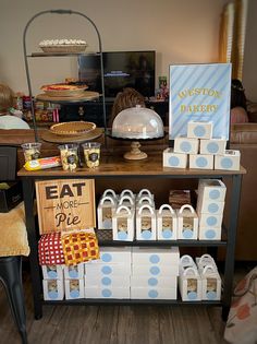 there are many boxes and bags on the counter in this store that is filled with treats