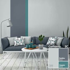 a living room with grey walls and white flooring is featured in this color scheme