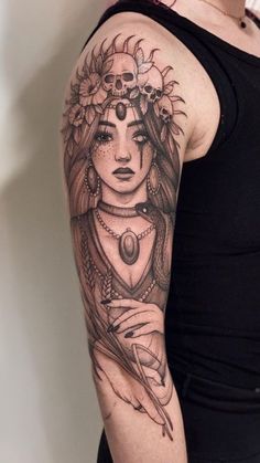 a woman's arm with a tattoo on it