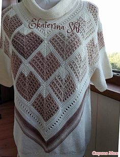 a knitted sweater with an argyle pattern on it