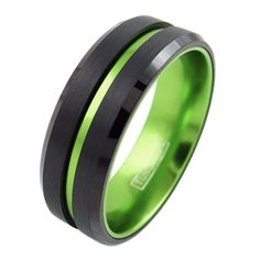 a black and green ring with an inlayed stripe on the inside of it