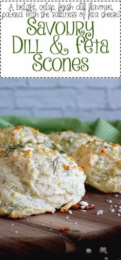 two biscuits on a cutting board with the words savory dill and feta scones