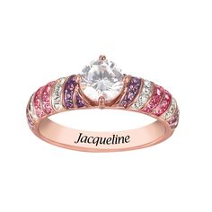 With each new season comes new beauty.Richly plated in 14kt rose gold-plating, the Spring Cherry Blossom Ring features a majestic simulated diamond center stone of 1-1/2 awe-inspiring carats and lavished with alternating rows of glittering crystals in a multitude of different colors capturing the essence of Spring. What's more, the inside of the ring is elegantly engraved with the name of your choosing for that extra special touch.The Spring Cherry Blossom Ring is colorful and carefree for easy Cherry Blossom Ring, Danbury Mint, Evening Attire, Awe Inspiring, New Season, Gold Plating, Rose Gold Plates, Perfect Match, Cherry Blossom