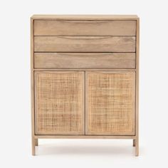 a wooden cabinet with wicker doors and drawers on the front, against a white background