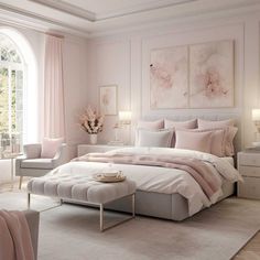 a bedroom with pink walls and white furniture