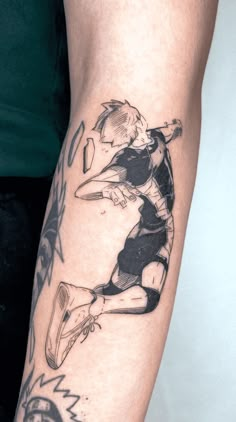 a person with a tattoo on their arm