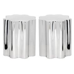 pair of modern chromed metal side tables