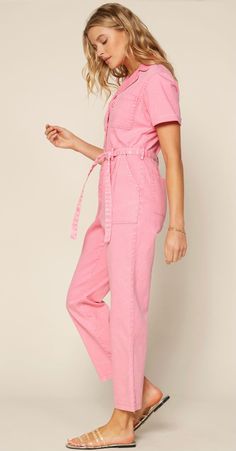 Jump for joy in this darling pink utility jumpsuit! Pink Mineral Washed Utility Jumpsuit. 97% Cotton 3% Spandex 6 Pockets, Pleated Detail, & Cuffed Short Sleeves Button Closure Waist Tie Spring Utility Jumpsuits And Rompers With Pockets, Spring Utility Belted Jumpsuits And Rompers, Belted Utility Jumpsuits And Rompers For Spring, Belted Utility Jumpsuit For Spring, Spring Cotton Belted Jumpsuits And Rompers, Fitted Utility Jumpsuits And Rompers With Belt, Fitted Belted Utility Jumpsuits And Rompers, Summer Pink Jumpsuits And Rompers With Pockets, Trendy Pink Cotton Jumpsuits And Rompers