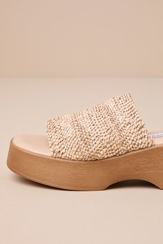 It's easy to create iconic, Boho-inspired 'fits on the daily when you've got the Steve Madden Slinky30 Raffia Platform Slide Sandals! A stretchy, extra-wide woven raffia toe strap tops a chunky platform sole with a rounded toe bed. Chic, slide-on design makes for easy, everyday styling! Available in whole sizes only. 2. 25" platform heel. Cushioned insole. Felted rubber sole has nonskid markings. Man made materials. Imported. Lulus | Slinky30 Raffia Platform Slide Sandal Heels | Size 8. Chunky Platform Slip-on Slides For Spring, Spring Chunky Platform Slip-on Slides, Beach Slip-on Sandals With Chunky Platform, Slip-on Platform Sandals With Straw Material, Beige Slip-on Platform Sandals, Platform Slide Sandals, Size 11 Heels, Platform Slides, Sandal Heels